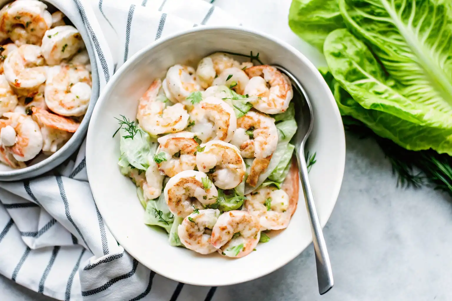 Shrimp Salad Recipe 5 Shrimp salad recipe with creamy dressing, fresh herbs, and crunchy vegetables in a white bowl.